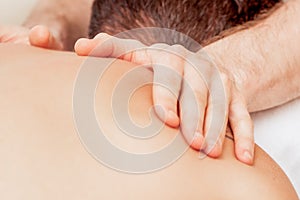 Man is receiving back massage