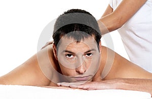 Man receiving massage relax close-up portrait