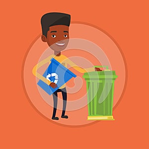 Man with recycle bin and trash can.