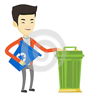 Man with recycle bin and trash can.