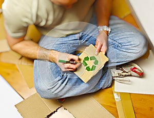 Man and recycling paper