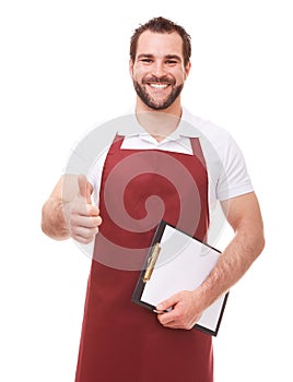 Man with red apron makes a gesture thumb up