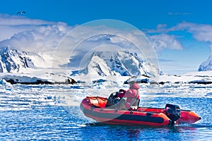 Man in the red boat