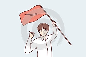 Man with red flag in hand makes victory gesture showing leadership qualities and motivating people