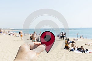 Man with a red marker in La Barceloneta beach photo