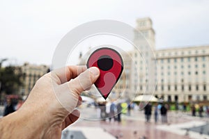 Man with red marker in Placa Catalunya, Barcelona photo