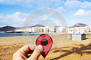 Man with a red marker at Playa del Ingles, Spain photo