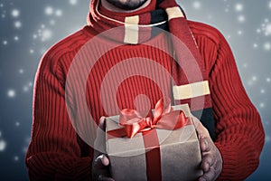 Man with red ribbon gift box