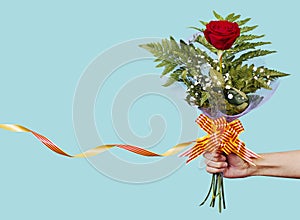 Man with a red rose for Saint George Day
