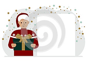 A man in a red sweater is holding a large gift box with a bow. New Year or Christmas.