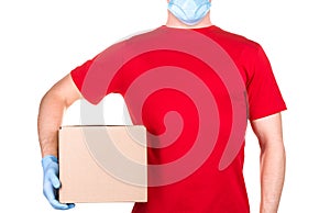 Man in red t-shirt and blue medical gloves holding cardboard box isolated white