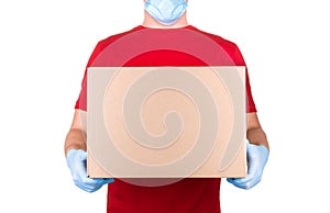 Man in red t-shirt and blue medical gloves holding cardboard box isolated white