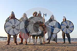 Man reenactor playing gusli