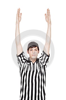 Man in referee uniform making touchdown sign