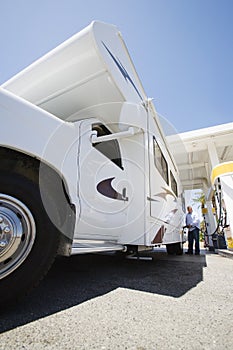 Man Refueling RV