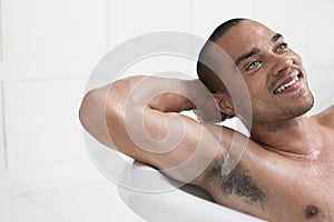 Man Relaxing In Bathtub