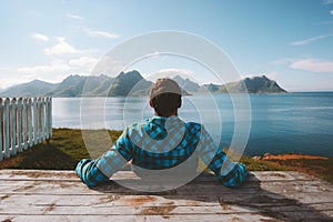 Man relaxing on beach enjoying sea view adventure travel summer vacations