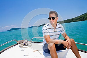 Man Relaxing On A Boat