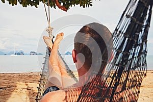 Man relaxing in the hammock
