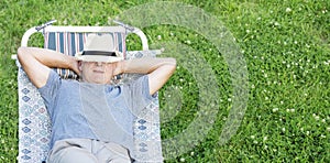 Man relaxing in a hammock top view