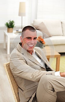 Man relaxing in his living room