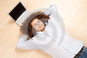 Man Relaxing with Laptop