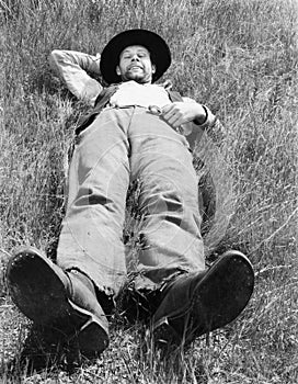 Man relaxing in meadow
