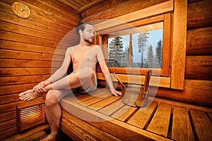 Man relaxing in sauna