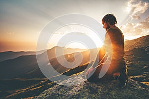 Man relaxing at sunset mountains Travel Lifestyle