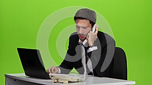 Man reluctantly picks up the phone