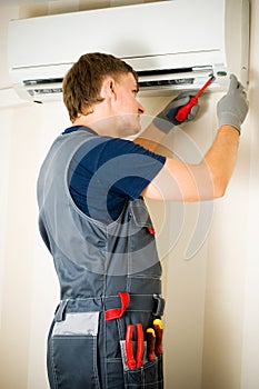 Man repair air-conditioner