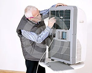 Man repairing air conditioning