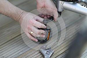 A man is repairing a bicycle