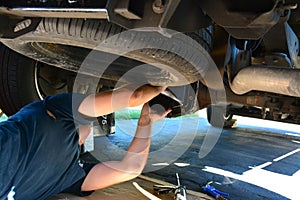 Man repairing a car or truck