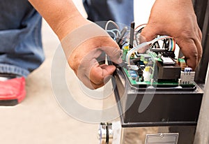 Man repairing electronic control system