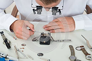 Man Repairing Wrist Watch