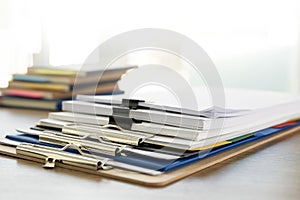 Man report stack paper folder close up stacking of office working document with paper legal paperwork on top