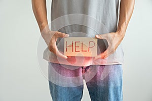 Man request for help private parts feeling discomfort from disease and inflammation. Venereal, testicular cancer. bladder problems photo