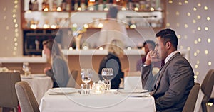 Man, restaurant and waiting for date, sad and impatience or late for meeting and unhappy or fear. Male person, annoyed