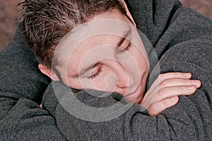 Man resting on his arms