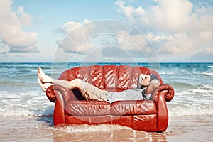 Man resting in leather couch