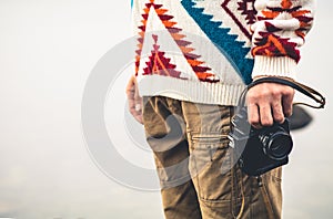 Man with retro photo camera Fashion Travel Lifestyle