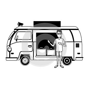 Man with retro van and luggage inside in black and white
