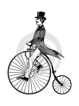 Man on retro vintage old bicycle engraving vector photo