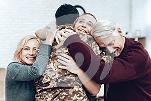 A Man Returns From The Military. Family Meeting.