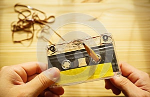 Man rewind a cassette tape