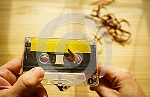 Man rewind a cassette tape