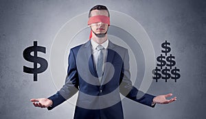Man with ribbon on his eye holding dollar signs