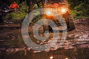 Man riding atv vehicle on off road track ,people outdoor sport a