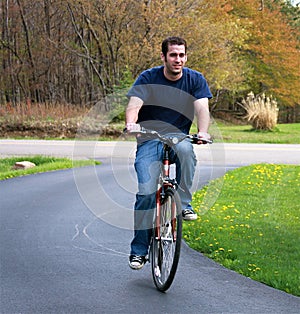 Man Riding Bicycle